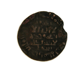Medieval arabian copper coin dirham on white background