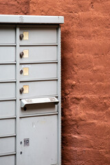Fototapeta na wymiar Mailbox Close Up Texture with Orange Negative Space