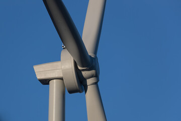 Close up of wind mill turbine with a clear blue sky background. Shot in Sweden, Scandinavia