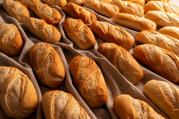DELICIOUS AND CRUSTY ARTISAN BREADS ROLLS FRESHLY MADE IN THE BAKERY.
