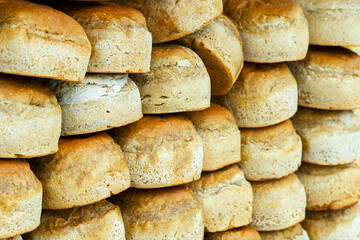 bread loaves in a row. Breads and baked goods close-up.   view of loaves . bakery products