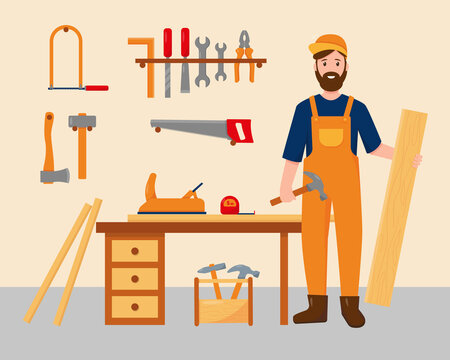 Carpenter in his workplace with work tools.
