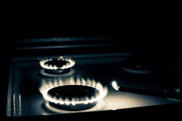 gas burner at night, blurred foreground and background with bokeh effect