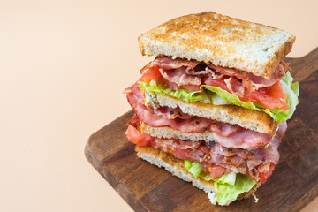 A BLT is a type of sandwich, named for the initials of its primary ingredients, bacon, lettuce and...