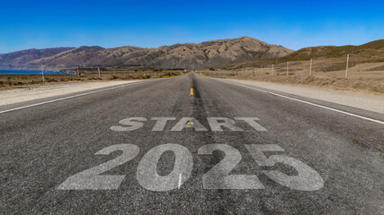 Start 2025 written on highway road to the mountain