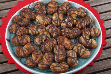 small homemade chocolate palms as sweet temptation snack