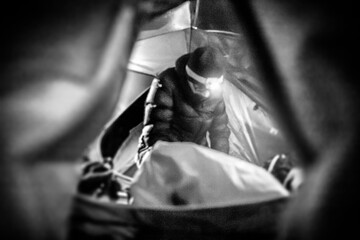 A person working within the tent