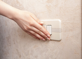 girl pushing the switch button