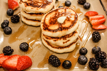 Pancakes and berries for breakfast