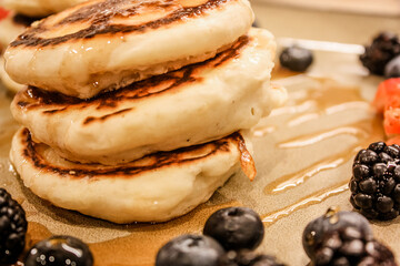 Pancakes and berries for breakfast