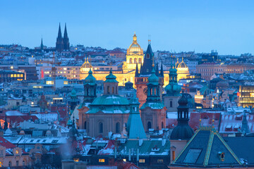 Prague - Spires of the Old town and illuminated National museum. - 413870678