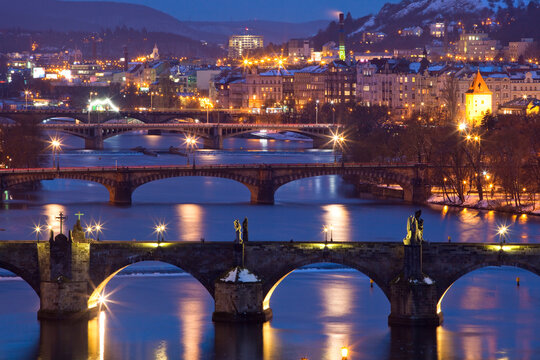 Prague - bridges over Vltava river at dusk.