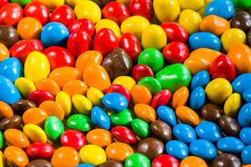 Fototapeta na wymiar Candies background colorful candies, red, green, blue, orange and yellow colors