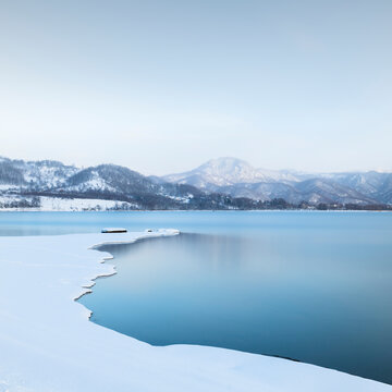 Long exposure shot of winter at lake Toya, Hokkaido, Japan