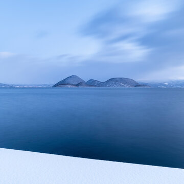 Long exposure shot of winter at lake Toya, Hokkaido, Japan
