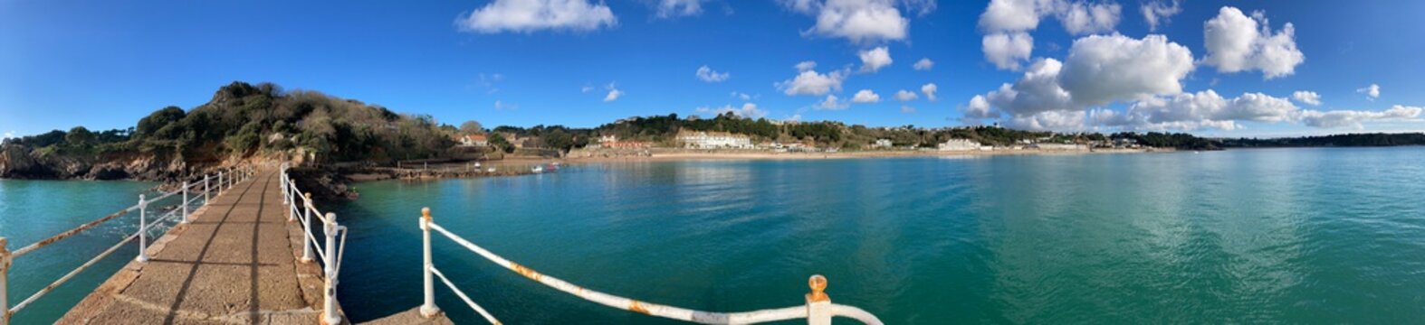 St Brelades Bay, Jersey, U.K. Panoramic image of a beautiful bay on a sunny Winter day shot from the pier.