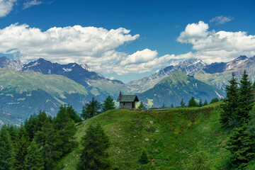 Fototapeta na wymiar Mountain landscape at summer along the road from Mortirolo pass to Aprica