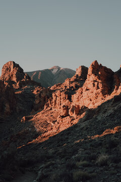 Scenic view of the arid mountains and the volcano of Teide