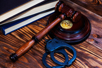 bitcoin, judge's hammer, handcuffs. Concept bitcoin ban, violation of the law.