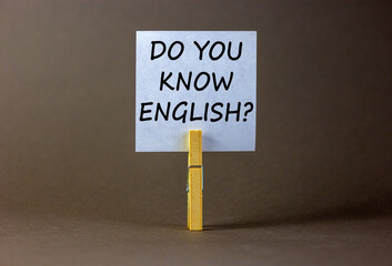 Do you know english symbol. White paper with words 'did you know', clip on wood clothespin....