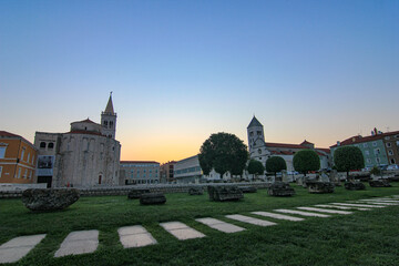 Fototapeta premium Zadar, Croatia / 31st July 2020: St Donat church and St Anastasia (sveta Stosija) Cathedral, St Mary Church and roman forum square famous landmarks in Zadar