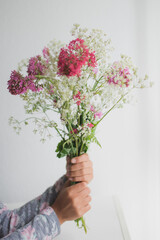 person holding a bouquet