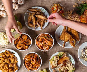 Shrimp, seadfoof to restaurants. Fried frish. 