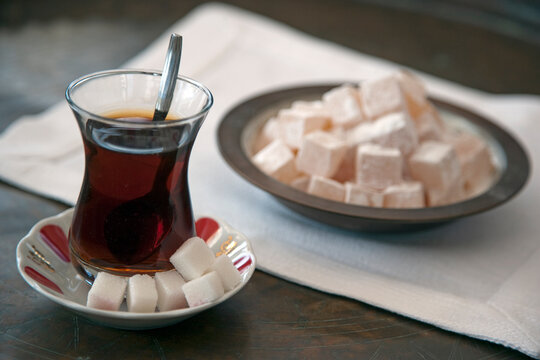A glass of Turkish Tea and Bowl of Turkish Delight or Loukoum. Istanbu
