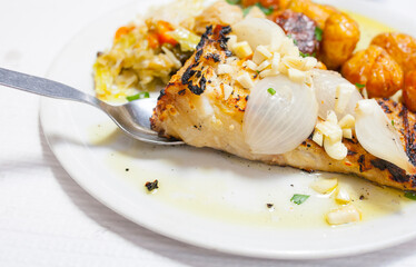 Roasted codfish with potatoes or Bacalhau a Bras