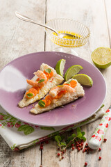 fish fillet with shrimp pink pepper carrots and lime