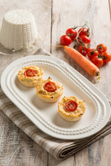 ricotta cheese flan with tomaotes and carrots