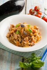spaghetti with fresh salmon tomatoes and eggplant