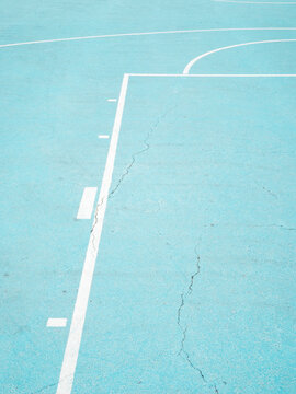 White lines on blue basketball court