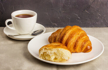 Breakfast with croissant selective focus