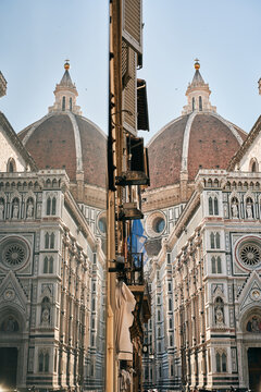 Facade of cathedral and dome with identical reflection