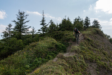 Fototapeta premium MTB Single track on the col de Coux, les Portes du Soleil, France
