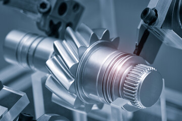 Gears, impaled on the shaft spline. Replacement spare part of the machine tool.