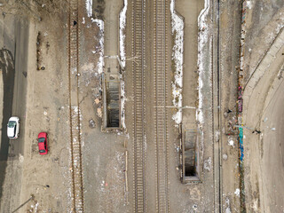 Railroad tracks. Aerial drone view. Winter cloudy morning.