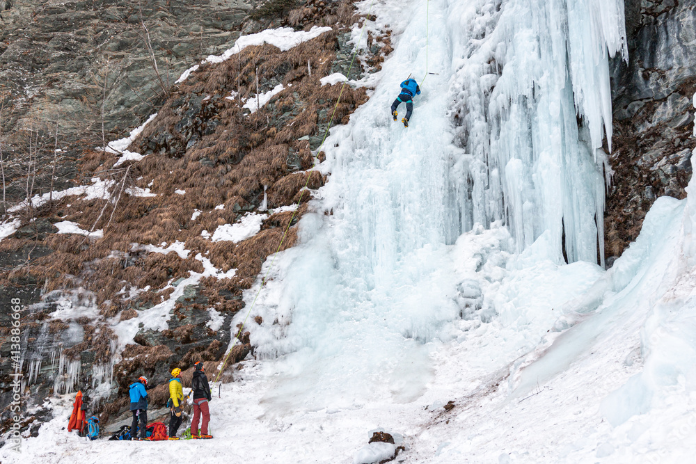 Canvas Prints Ice Climbers on a single pitch route in Cogne, Aosta Valley, Italy