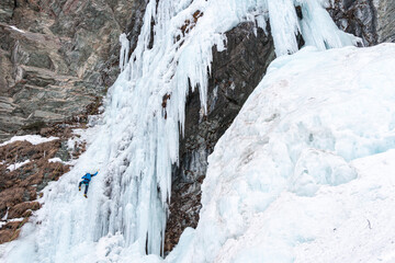 Fototapeta na wymiar Learning ice climbing, Cogne, Aosta Valley, Italy