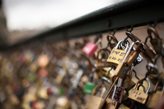 Close-up of love locks at Pont des Arts