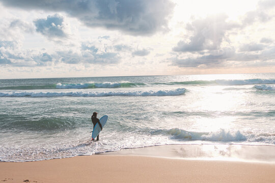 Surfer looking at the waves, culs nuls beach, hossegor, landes, france 
