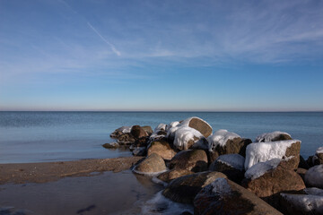 Ice covered rocks by the Baltic Sea in winter