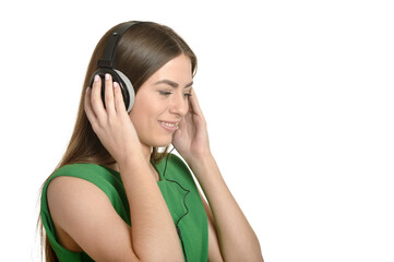 Naklejka premium Girl listening to music in headphones