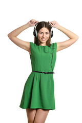 Obraz na płótnie Canvas Girl listening to music in headphones