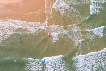 Learning surf in white waves in summer, landes, france