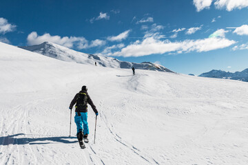 Fototapeta na wymiar Splitboard and Ski touring, Beaufortain, French Alps, France
