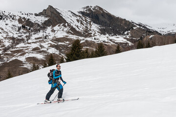 Fototapeta na wymiar Ski touring with mountains, Beaufortain, French Alps, France