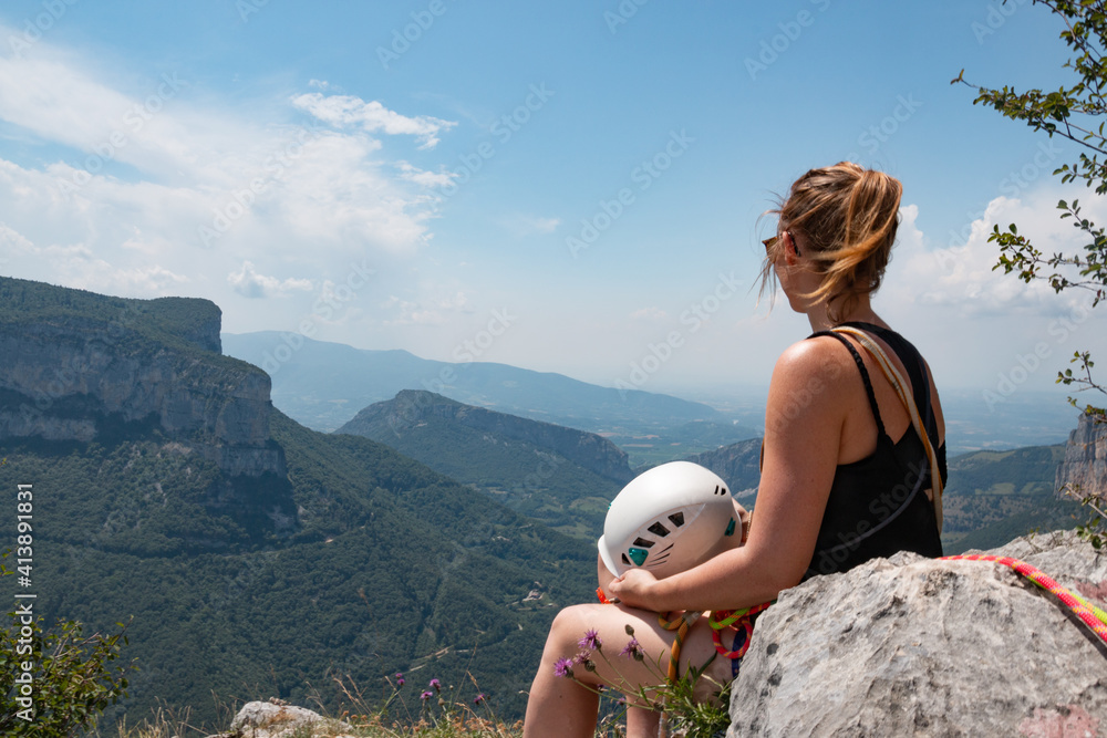 Wall mural Climber enjoying the view of the valley in Presles, Isère, France