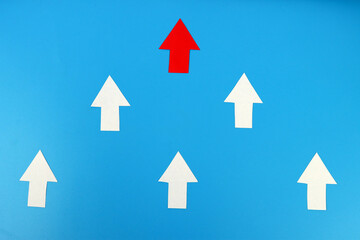Leadership concept. Red leader arrow leading team forward